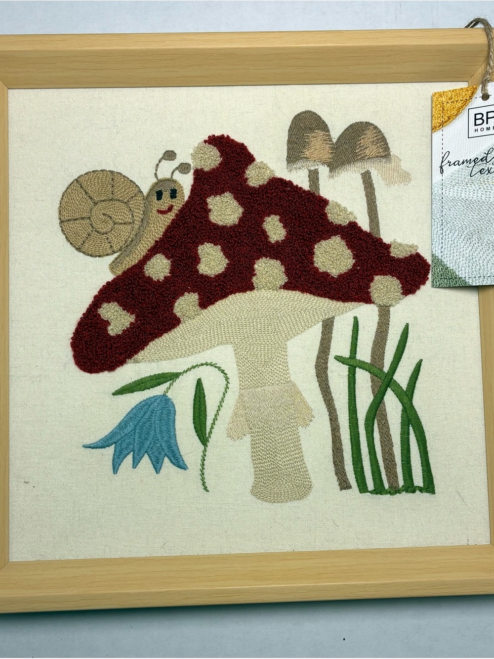 bp Framed Textiles Tag with White, Cream, Yellow, Green, Red Accents